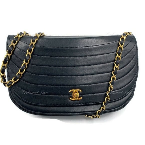 CHANEL Handbags - ❗️Sold❗️ CHANEL Vintage Lambskin Half Moon Flap Bag black/gold hardware